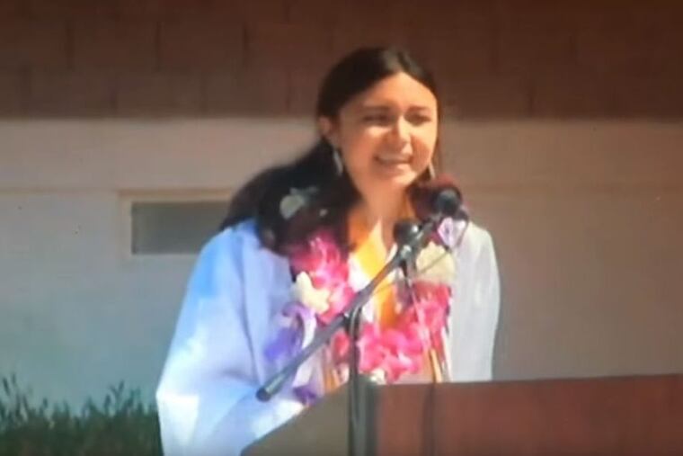 Lulabel Seitz, valedictorian at Petaluma High School, speaks during her graduation. Her speech was cut off by school officials.