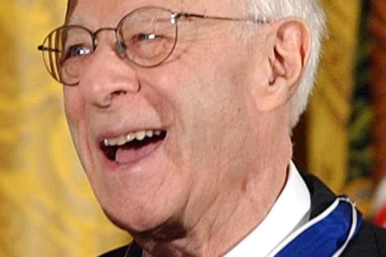 Norman Podhoretz receives the Presidential Medal of Freedom, the nation's highest civil award, from President George W. Bush during a ceremony in the East Room of the White House, June 23, 2004.