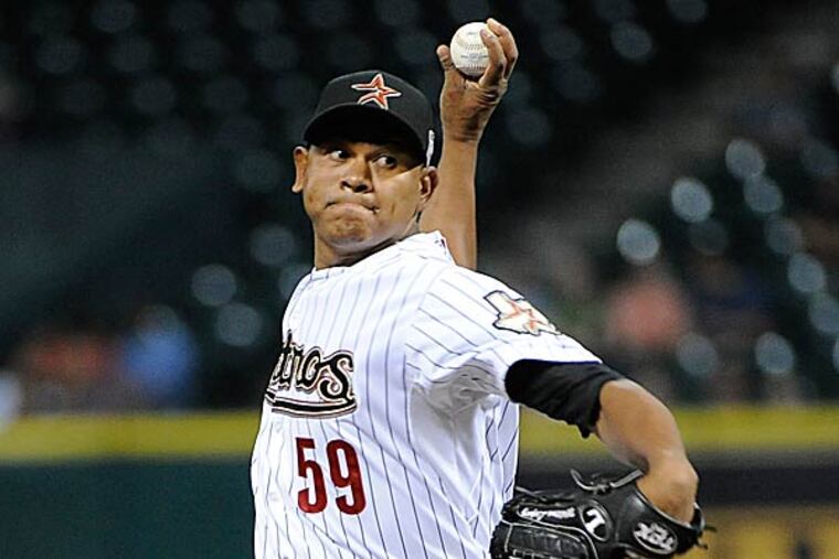 The widely reported proposed trade that had the Phillies acquiring Houston reliever Wilton Lopez went from on the verge of completion on Wednesday to dead on Thursday.(Pat Sullivan/AP)