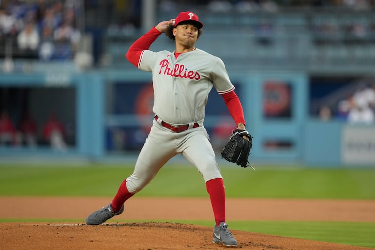 Philadelphia Phillies starting pitcher Taijuan Walker (99) throws during the first inning of a baseball game against the Los Angeles Dodgers.