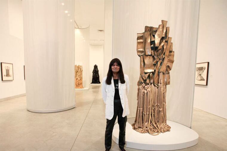 Barbara Chase- Riboud, 74, with her work "Malcolm X #3," 1969. (Steven M. Falk / Staff Photographer)