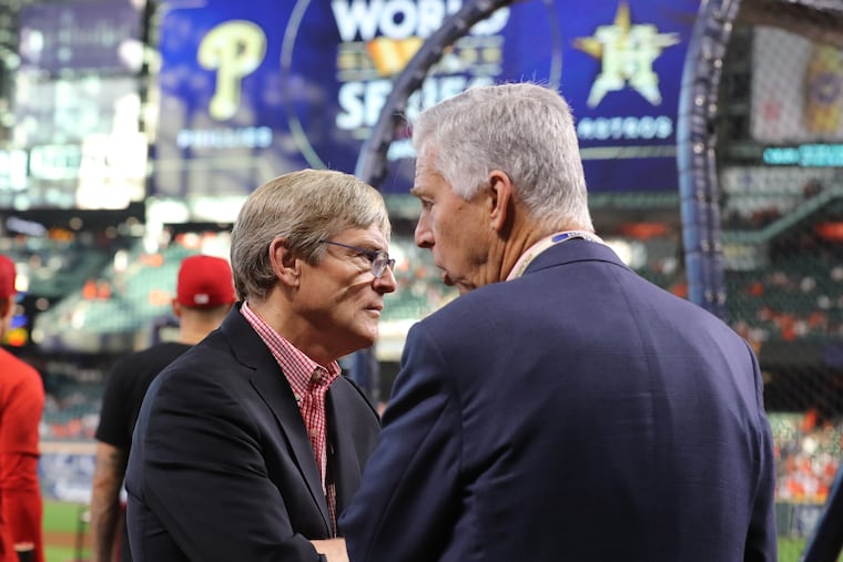 Phillies managing partner John Middleton (left) and president of baseball operations Dave Dombrowski talk before Game 6 of the World Series in November.