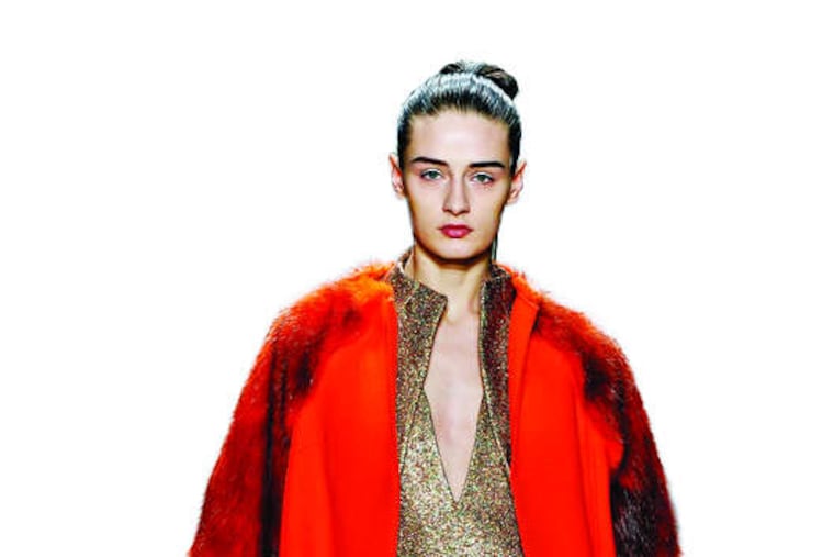 A deep V-neck crosses into adventurous territory in an outfit modeled for Son Jung Wan.