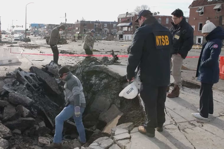 Federal transportation safety investigators at the scene of the Jan. 31 plane crash on Cottman Avenue near Roosevelt Mall in images from NTSB video released on Sunday, Feb. 2, 2025.