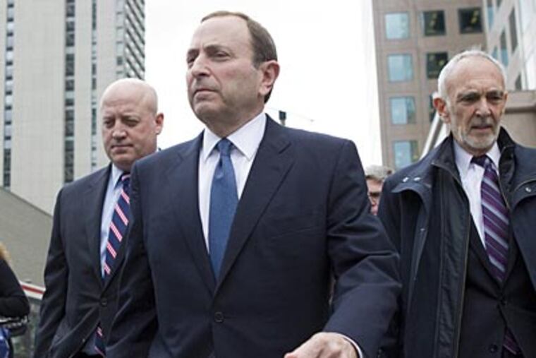 NHL commissioner Gary Bettman leaves NHLPA offices on Thursday, October 18. (Chris Young/AP/The Canadian Press)