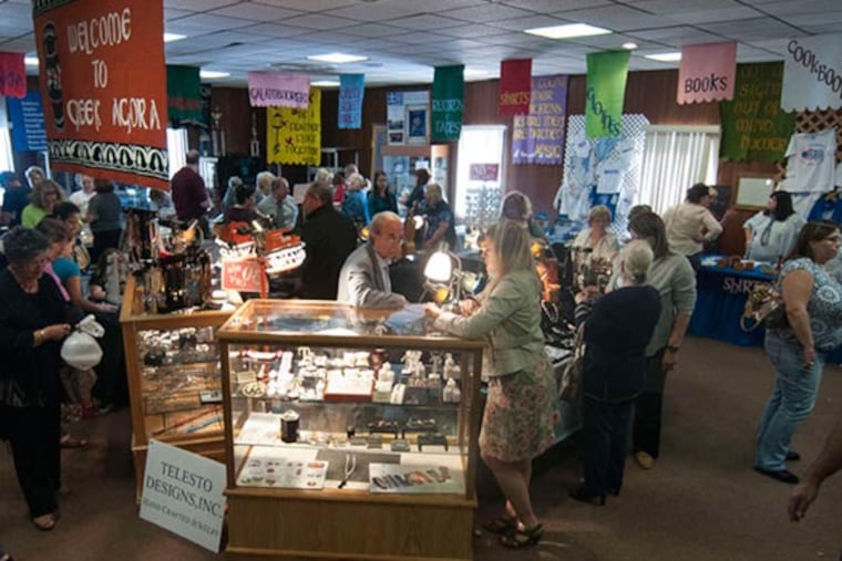 The gift shop of St. Thomas Greek Othordox Church was turned into a virtual Greek Agora at their 2013 Greek Agora event. Vendors sold jewelery, pastries and other Greek inspired creations to guests of the event. (PATRICK MCPEAK/STAFF PHOTOGRAPHER)