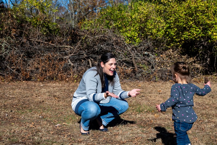 State Sen. Amanda Cappelletti, with her daughter at home in Montgomery County Sunday, was the first state senator to give birth while in office. About a week ago, she had an abortion to prevent complications from allowing her nonviable pregnancy to end on its own. She wants people to consider the right to such access as they vote in Tuesday's election.