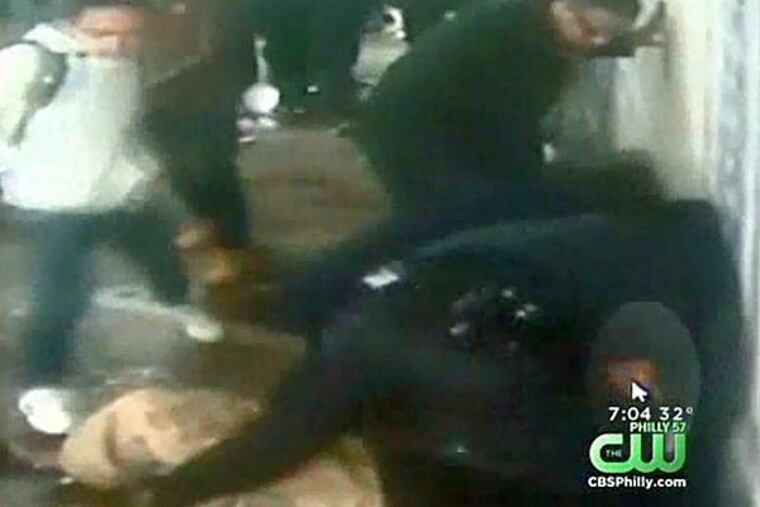 A SEPTA officer struggled to get the upper hand against a large subway passenger who reportedly had a gun. Several passengers jumped in to help subdue the man. (Video courtesy of NDN/CW)