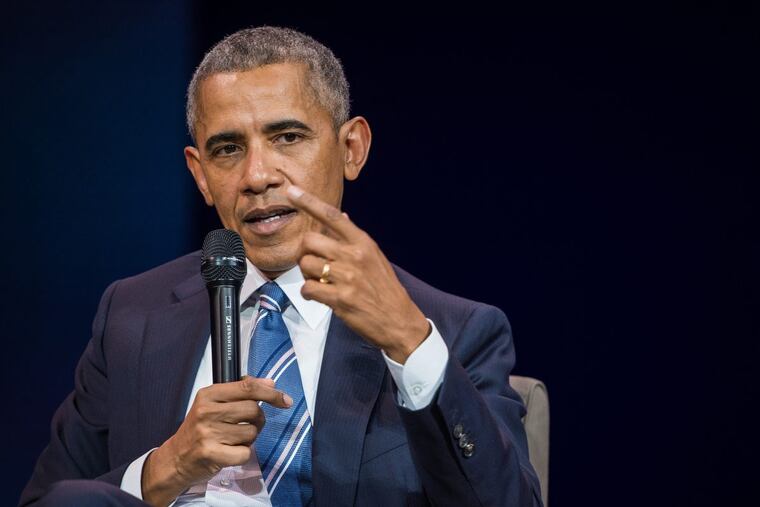 Former U.S. President Barack Obama delivers speech at a conference during his first visit to France since he left the White House on December 2, 2017, in Paris.