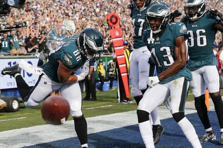 Philaelphia Eagles tight end Trey Burton spikes the football after catching a second-quarter touchdown against the Los Angeles Rams.