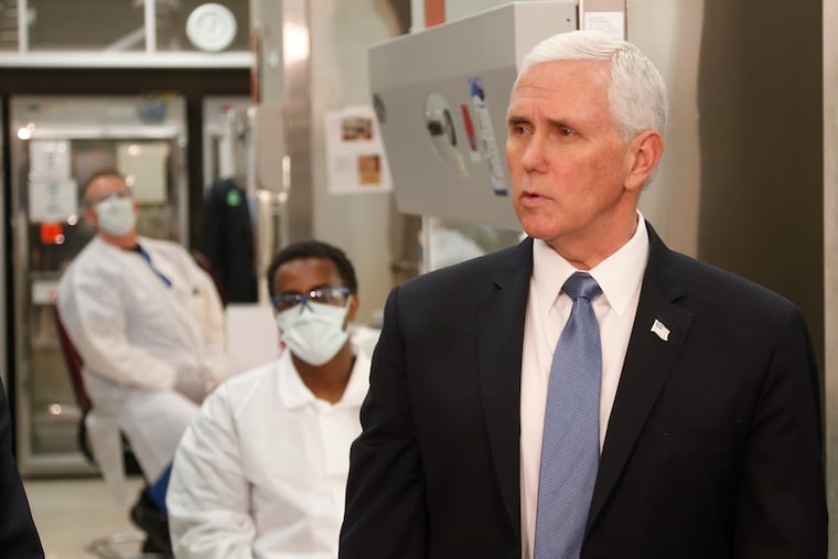 Vice President Mike Pence visiting the molecular testing lab at the Mayo Clinic in Rochester, Minn., on April 28, 2020 Pence chose not to wear a face mask while there, a violation of a facility policy requiring them.