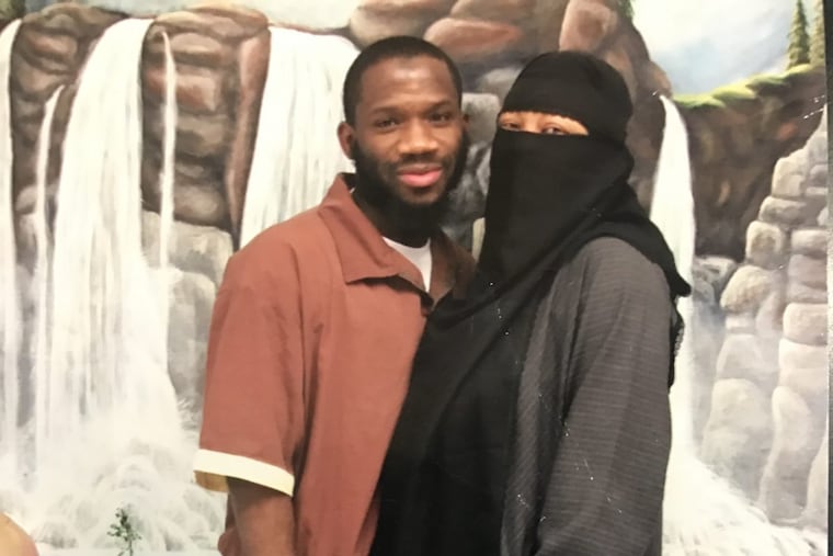 Johnny Berry with his wife, Qiana, at Graterford state prison.