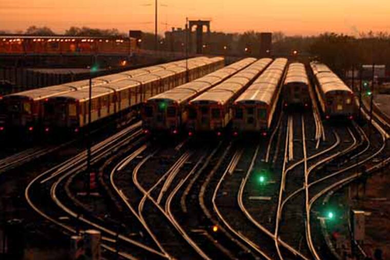 The sun rising over idled Broad Street Subway trains at SEPTA's Fern Rock Transportation Center on Nov. 3, 2009 when the Transport Workers Union Local 234 went on strike, crippling the city division of the transit agency. (FILE - Tom Gralish/Staff Photographer)