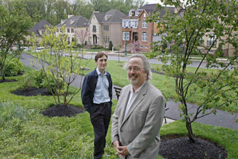 Woodmont, a project of W. Joseph Duckworth (right), president of Arcadia Land Co., and son Jason, vice president, now is on the town's Web site. (Michael S. Wirtz / Staff Photographer)