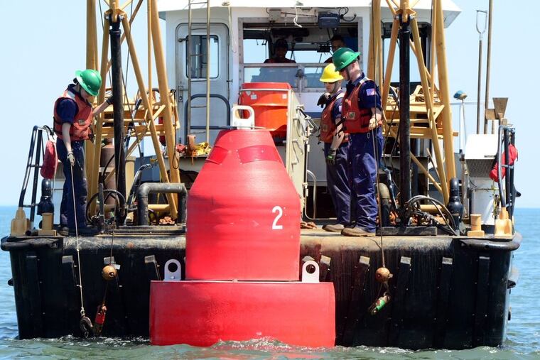 The Coast Guard has installed eight buoys to mark the newly dredged channel through Little Egg Inlet.