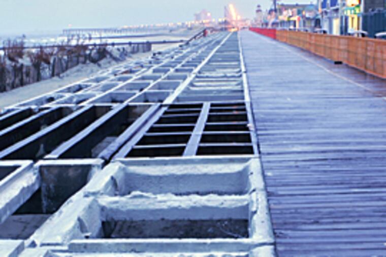 A swath of Ocean City's famed boardwalk awaits wood for its refurbishment.