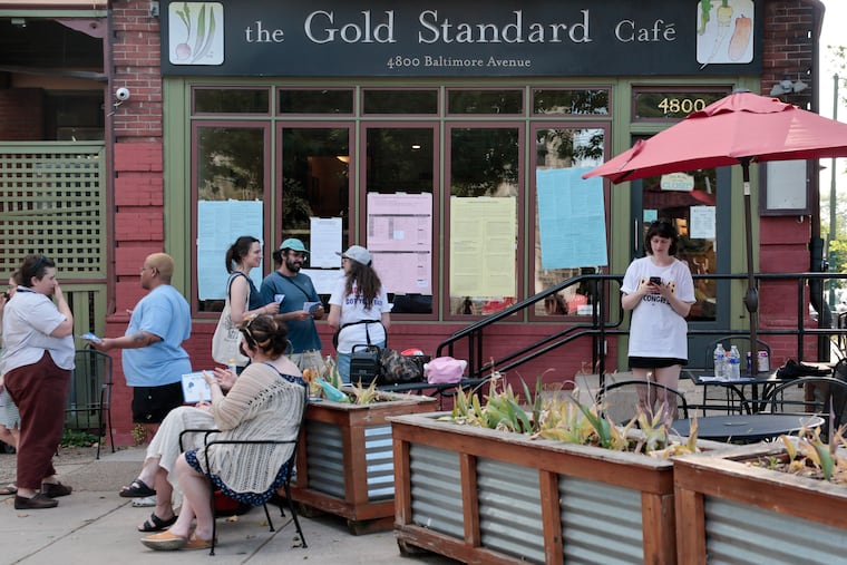 Voters and community outside of a polling spot at the Gold Standard Cafe Tuesday, May 19, 2026, in Philadelphia.