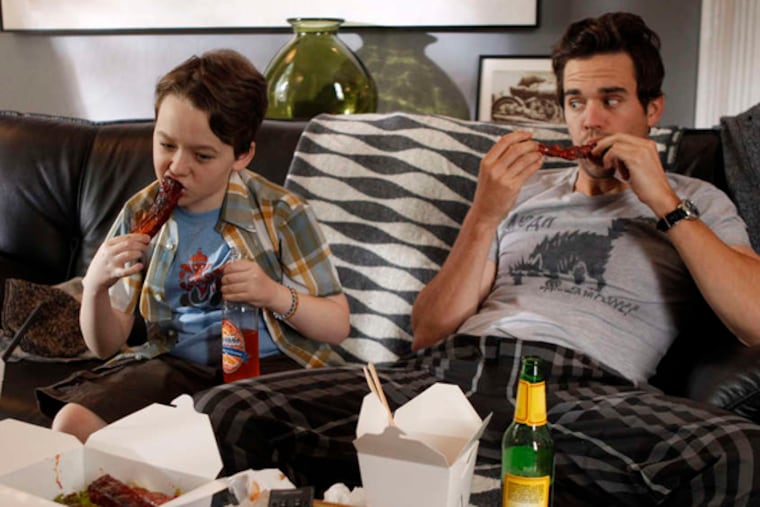 "About a Boy," based on Nick Hornby's 1998 novel, stars Benjamin Stockham (left) as young Marcus and David Walton as the largely irresponsible, but ever-improving, Will.