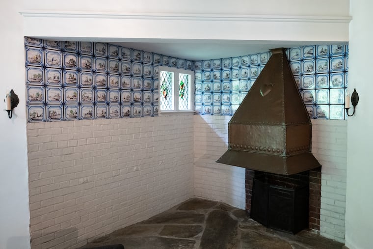 Details like Dutch tiles in the kitchen made the Chestnut Hill home appealing. 