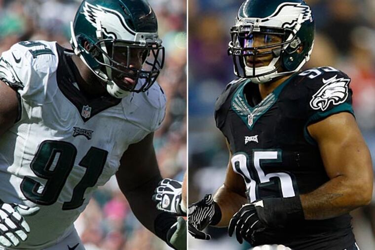 Fletcher Cox (left) and Mychal Kendricks. (Chris Szagola/AP) (Yong Kim/Staff Photographer)