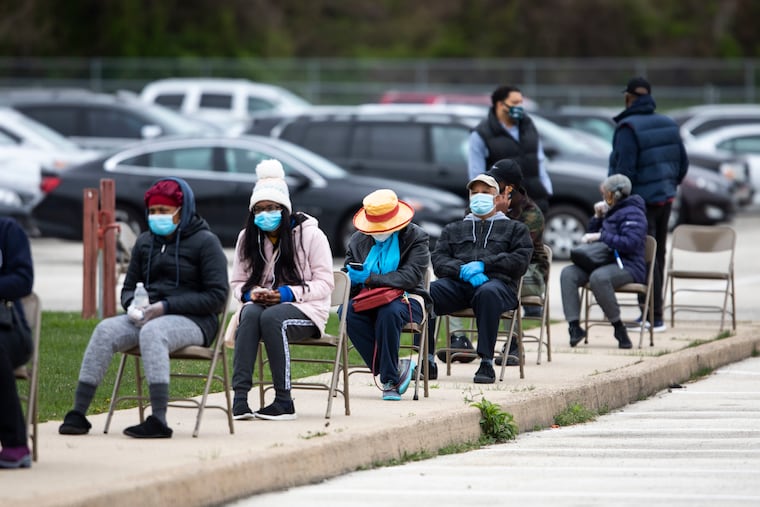 People lined up for coronavirus tests at Enon Tabernacle Baptist Church in Philadelphia, Pa. on Monday, April 20, 2020. The Black Doctors COVID-19 Consortium is providing COVID-19 testing in the hardest hit areas of Philadelphia.