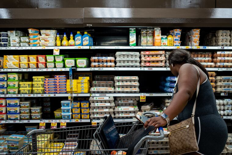 A customer shops in a Kroger grocery store in Houston.