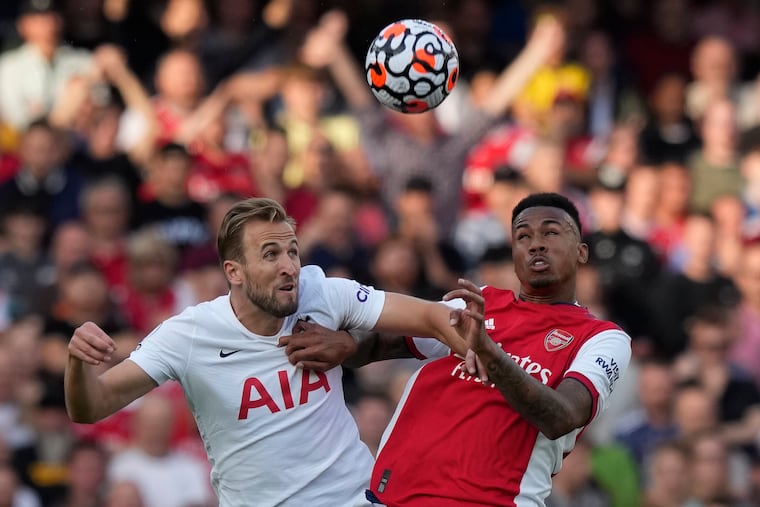 Tottenham's Harry Kane (left) battles for the ball against Arsenal's (Gabriel) during the last North London Derby, last September at Arsenal's Emirates Stadium.