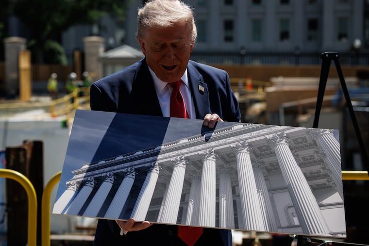 President Donald Trump speaks to reporters about construction at the former site of the East Wing on May 19.