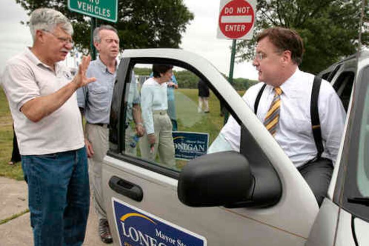At the Burlington City Riverfront Promenade on Friday, Steve Lonegan gets a farewell from supporters Rocky Spano (left) of Jacobstown and Frank Christmas of Riverton.
