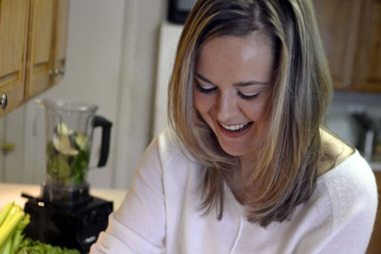 Alene Brennan makes a smoothie in her home January 6, 2015. (TOM GRALISH / Staff Photographer)