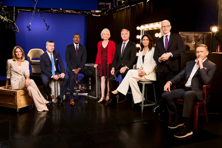 Bill Owens (right) is seen in this 2023 photo alongside "60 Minutes" reporters (from left) Sharyn Alfonsi, L. Jon Wertheim, Bill Whitaker, Lesley Stahl, Scott Pelley, Cecilia Vega, and Anderson Cooper.