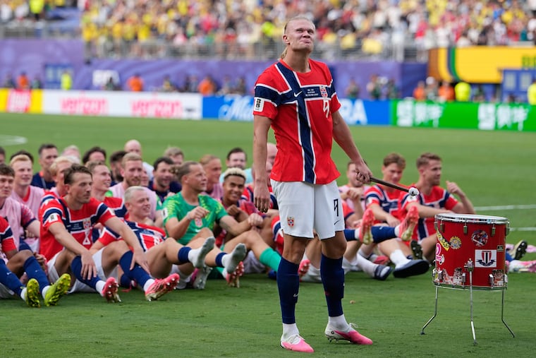 Erling Haaland leading Norway's players and fans in the Viking rowing chant that has gone viral during this World Cup.