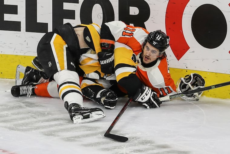 There was plenty of rough stuff during Tuesday's Flyers-Penguins game, including Travis Konecny and Sidney Crosby earning coincidental roughing minors for this second-period wrestling match.