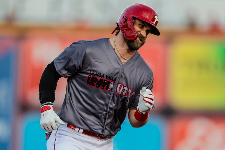 Bryce Harper hit a solo home run against the Gwinnett Stripers in the first at-bat of his rehab assignment on Tuesday.