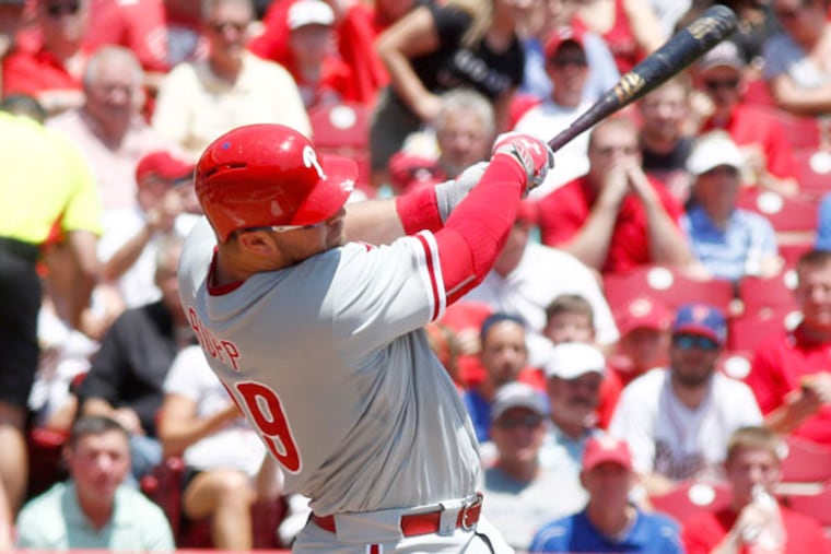 Phillies catcher Cameron Rupp hits an RBI single in the second inning at Great American Ball Park. (David Kohl-USA TODAY Sports)