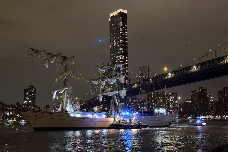 A masted Mexican Navy training ship, the Cuauhtémoc, sits stranded after colliding with the Brooklyn Bridge after, Saturday, May 17, 2025, in New York. (AP Photo/Kyle Viterbo)