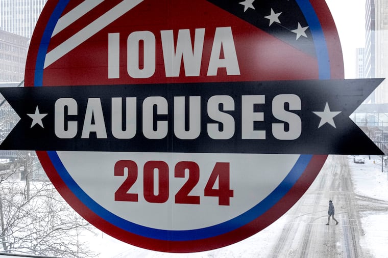A sign for the Iowa Caucuses in downtown Des Moines, Iowa, on Saturday, Jan. 13, 2024.