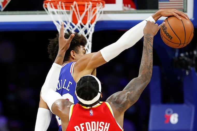 Sixers guard Matisse Thybulle blocks the shot attempt by Atlanta Hawks forward and former Westtown School standout Cam Reddish during the second quarter of Saturday's game.