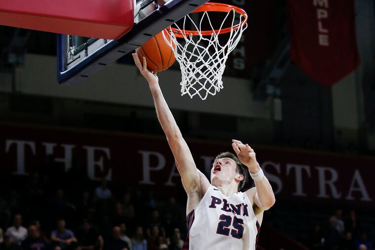 AJ Brodeur lays in two points in a February game against Dartmouth. The Quakers beat the Big Green on the road on Saturday.