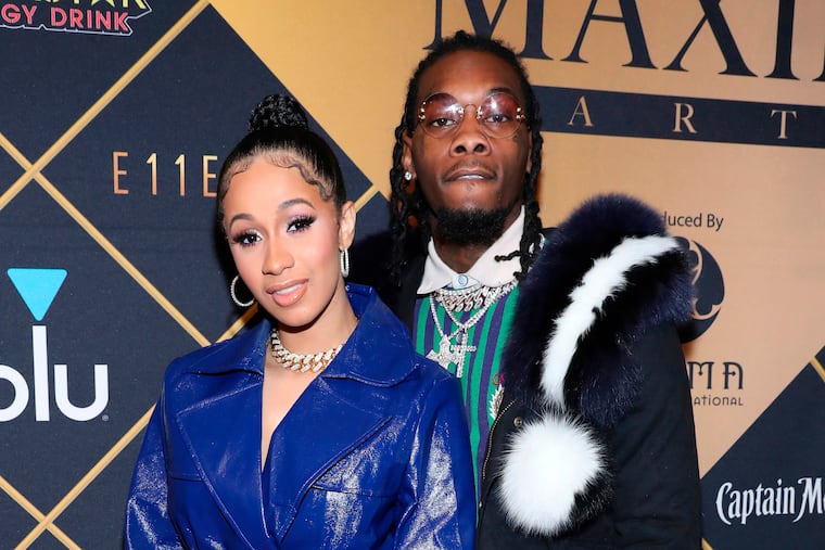 FILE- In this Feb. 3, 2018, file photo, Cardi B, left, and Offset arrive at the Maxim Super Bowl Party at the Maxim Dome in Minneapolis. Cardi B is asking the public to not bash Offset, who became the target of internet outrage after he interrupted her set at the Rolling Loud Festival in Los Angeles Saturday night, Dec. 15, 2018 and asked her to get back together with him.