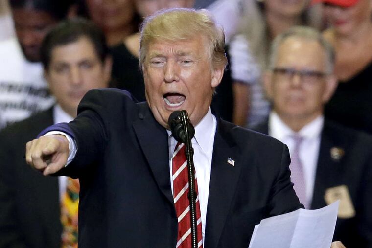 President Donald Trump speaks during a political rally in Phoenix on Tuesday.