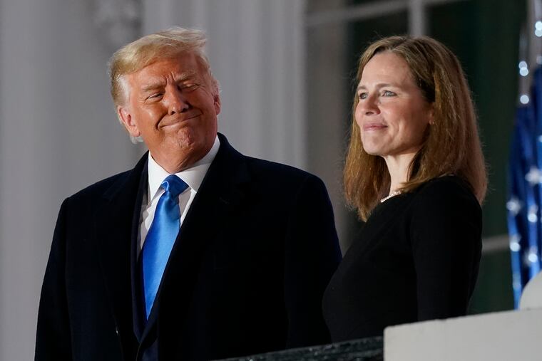 President Donald Trump and Amy Coney Barrett stood on the Blue Room Balcony after Supreme Court Justice Clarence Thomas administered the Constitutional Oath to her on the South Lawn of the White House on Monday.