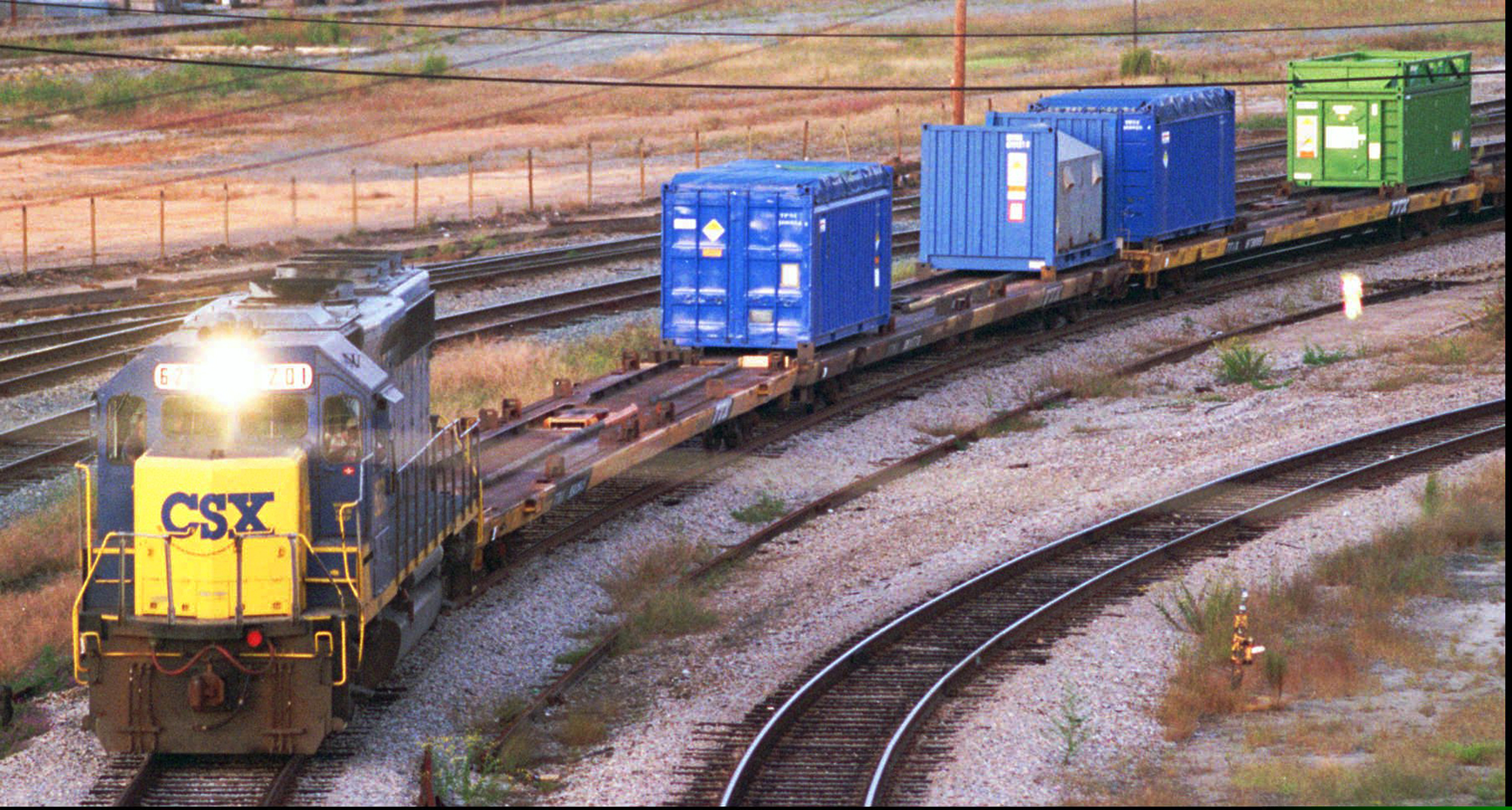 FILE - In this Sept. 29, 1994 file photo, a CSX Train with spent nuclear fuel passes through Florence, S.C., on its way to Savannah River Site Weapons Complex near Aiken S.C. Nevada and South Carolina are jostling for a home-field advantage of sorts in a federal court battle that could result in a metric ton of weapons-grade plutonium being stored 70 miles from Las Vegas. (Jeff Chatlosh/The Morning News via AP, File)