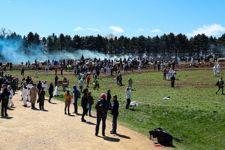 Activists attempt to gain entry into Ridglan Farms beagle breeding and research facility in April 2026, in Blue Mounds, Wis.