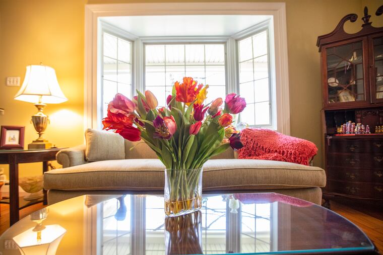 Jayne and Bill Wright replaced the original picture window in the rancher's living room with a bowed window. They have updated the house through their more than 40 years there and plan to "age in place."