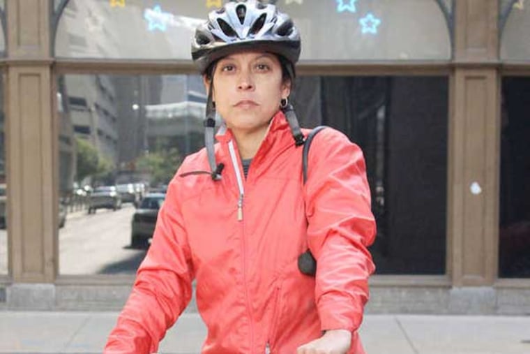 Will the third time be the charm for Daily News columnist Helen Ubiñas to have a successful ride to work on her bike? Maybe. (Jessica Griffin / Staff Photographer)