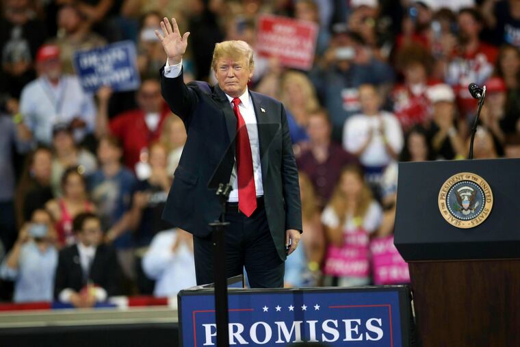 In this June 20, 2018 file photo, U.S. President Donald Trump waves to the crowd after speaking at a campaign rally, Wednesday, June 20, 2018, in Duluth, Minn.