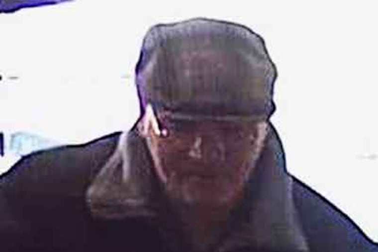 Bank robbery suspect from Morrisville surveillance video.