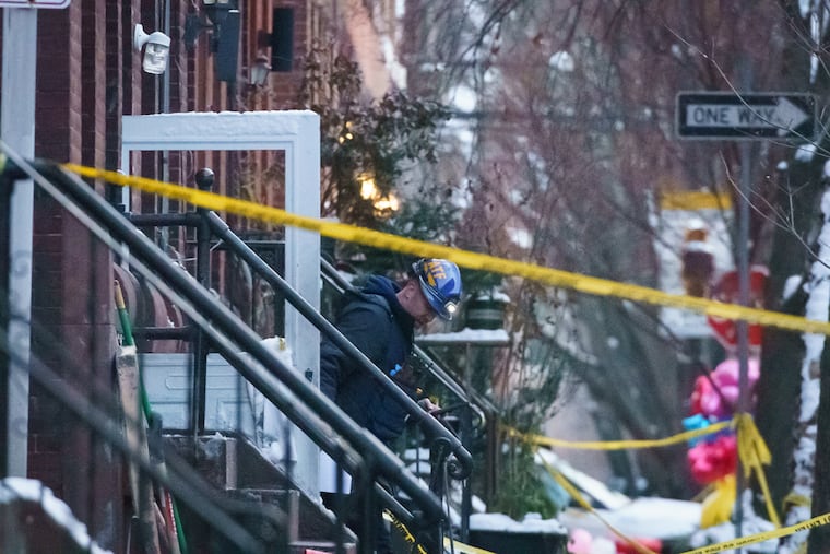 The investigation continues at a row house on 23rd Street between Poplar and Parrish Streets. A fire that began before sunrise on Wednesday killed 12 people - 9 children and 3 adults.
