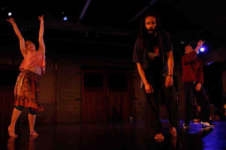 Vince Johnson's athletic "Drunken Monkey," about a troupe of warrior monks, was performed by Christina Gerena (left), Johnson, and Edwin Lopez.